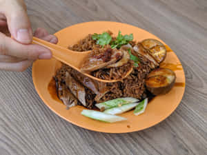 Succulent Duck Rice Congee From East Coast Lagoon Food Village Wallpaper