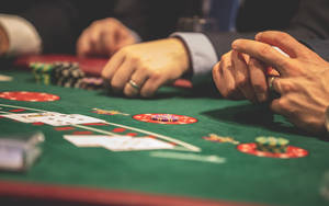 Suited Men Playing Blackjack Wallpaper