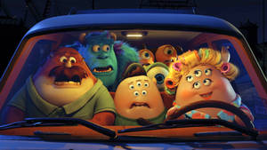 Sulley With Monsters In Car Wallpaper