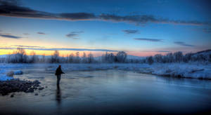 Summer Sets In As A Bass Fishing Enthusiast Enjoys The Thrill Of The Hunt Wallpaper
