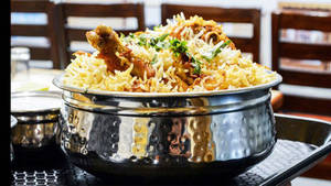 Sumptuous Biryani Served In A Silver Bowl Wallpaper