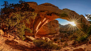 Sun Peeking At Arches National Park Wallpaper