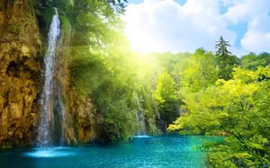 Sunny Waterfall Paradise Wallpaper