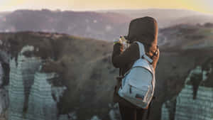 Sunrise Hiker Overlooking Valley Wallpaper