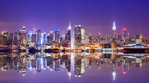 Sunrise Over The Manhattan Skyline In New York City Wallpaper