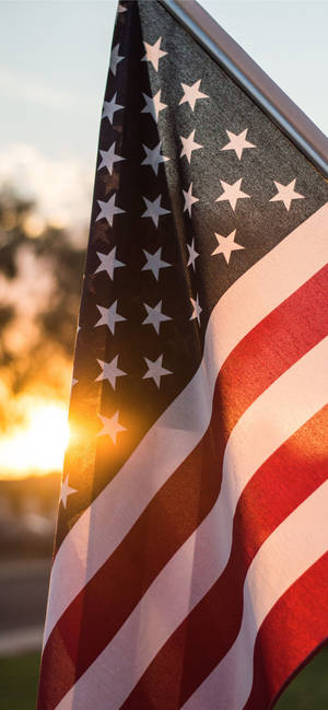 Sunset Behind Flag Of America Iphone Wallpaper