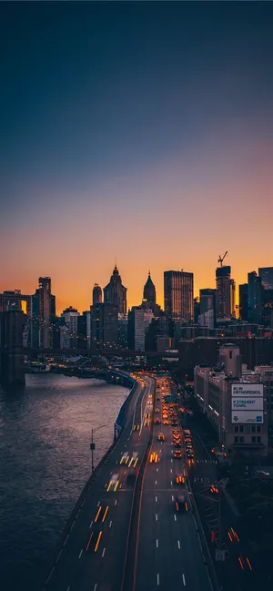 Sunset Cityscape Iphone Ios 10 Wallpaper