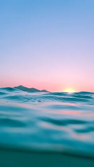 Sunset Iphone Display Of Ocean Wallpaper