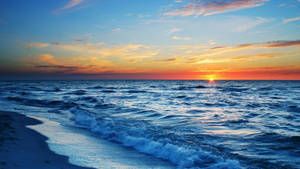 Sunset Ocean Brilliant Blue Wallpaper