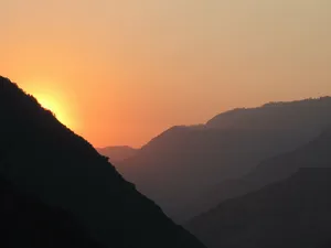 Sunset_ Over_ Mountain_ Ridges Wallpaper