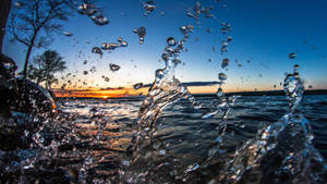 Sunset Splash Close-up Uhd Wallpaper