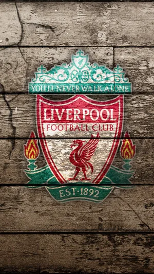 Supporter’s Artistry: Liverpool Fc Emblazoned On Wooden Plank Wallpaper