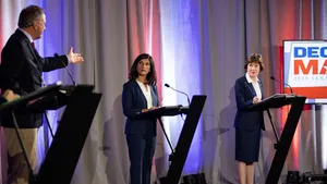 Susan Collins Engages In An Important Discussion During A Debate Wallpaper