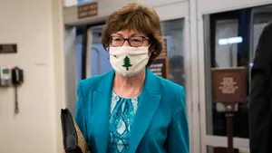 Susan Collins In A Facemask Wallpaper