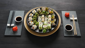 Sushi Bar On Black Plate Wallpaper