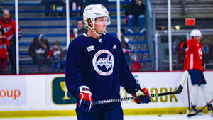 Swedish Athlete Nicklas Backstrom In Blue Jersey Wallpaper