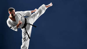 Taekwondo Player Black Belt High Kick Wallpaper