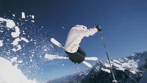 Take A Break From The Stresses Of Life And Enjoy A Day On The Ski Mountain. Wallpaper