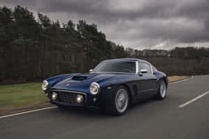 Take A Journey Through History With A Vintage Ferrari Wallpaper