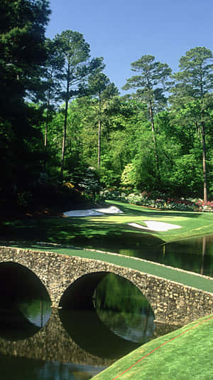 Take In The Beauty And Tranquillity Of Augusta National Golf Course On Your Iphone. Wallpaper