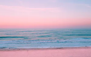 Take In The Breathtaking Beauty Of Pastel Beach Wallpaper