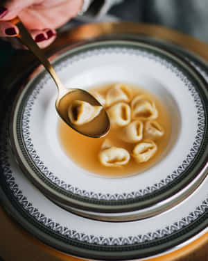Tasting Tortellini In Brodo Wallpaper