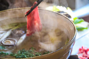 Tasty Meat In A Shabu-shabu Stew Wallpaper