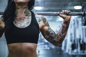 Tattooed Lady Weightlifting Wallpaper