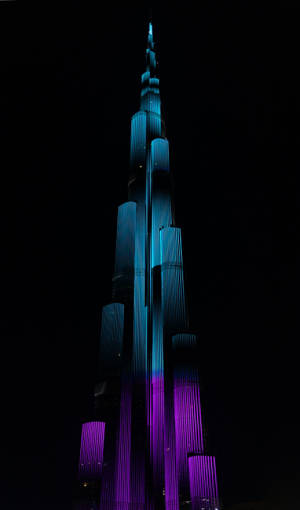 Teal And Violet Colors On Burj Khalifa Wallpaper