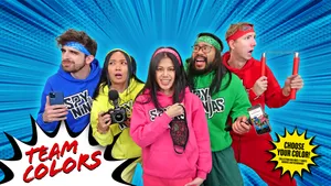 Team Colors - A Group Of People In Colorful Outfits Wallpaper