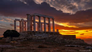 Temple Of Poseidon At Sunset Wallpaper