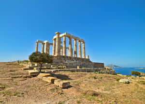 Temple Of Poseidon On Sunny Day Wallpaper