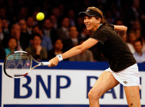 Tennis Legend Monica Seles Adorned In A Black Visor Wallpaper