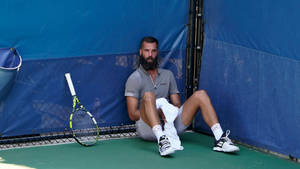 Tennis Star Benoit Paire Taking A Moment To Breathe Wallpaper