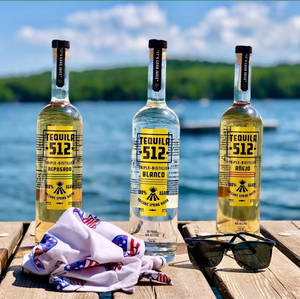 Tequila 512 Bottles Ocean Setting Wallpaper