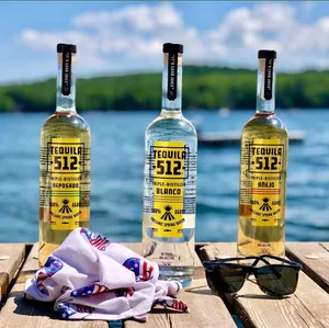 Tequila 512 Bottles Ocean Setting Wallpaper