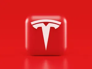 Tesla Logo With Colorful Lights Wallpaper