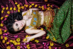 Thai Girl With Yellow Flowers Wallpaper