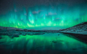 Thawing Lake Sensational Northern Lights Wallpaper