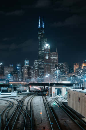 The Amazing Chicago Skyline At Night Wallpaper