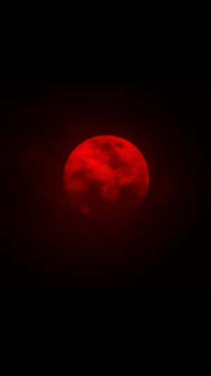 The Astrological Phenomenon Of A Blood Moon In The Night Sky. Wallpaper