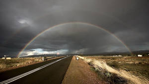 The Beauty Of A Rainbow In The Road Wallpaper