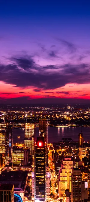 The City's Beauty Shines Brightly At Sunset Wallpaper