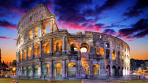 The Colossion In Rome At Sunset Wallpaper