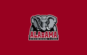 The Crimson Tide Proudly Stands Behind The Alabama Football Logo. Wallpaper