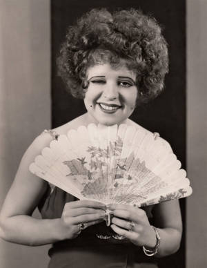 The Enchanting Clara Bow - Hollywood's Original 'it' Girl Wallpaper