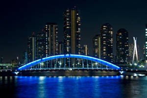 The Glowing Blue Eitai Bridge In Tokyo, Japan Wallpaper