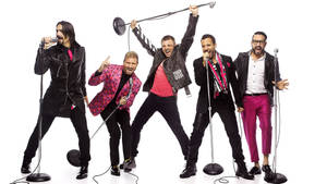 ____ The Iconic Backstreet Boys Rocking The Stage With Their Microphones Wallpaper