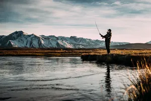 The Joy Of Fly Fishing In Nature Wallpaper