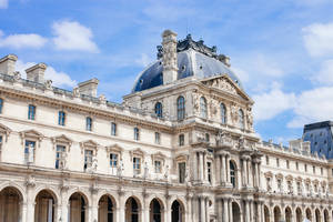 The Magnificient Cour Carrée Of The Louvre In Paris, France Wallpaper